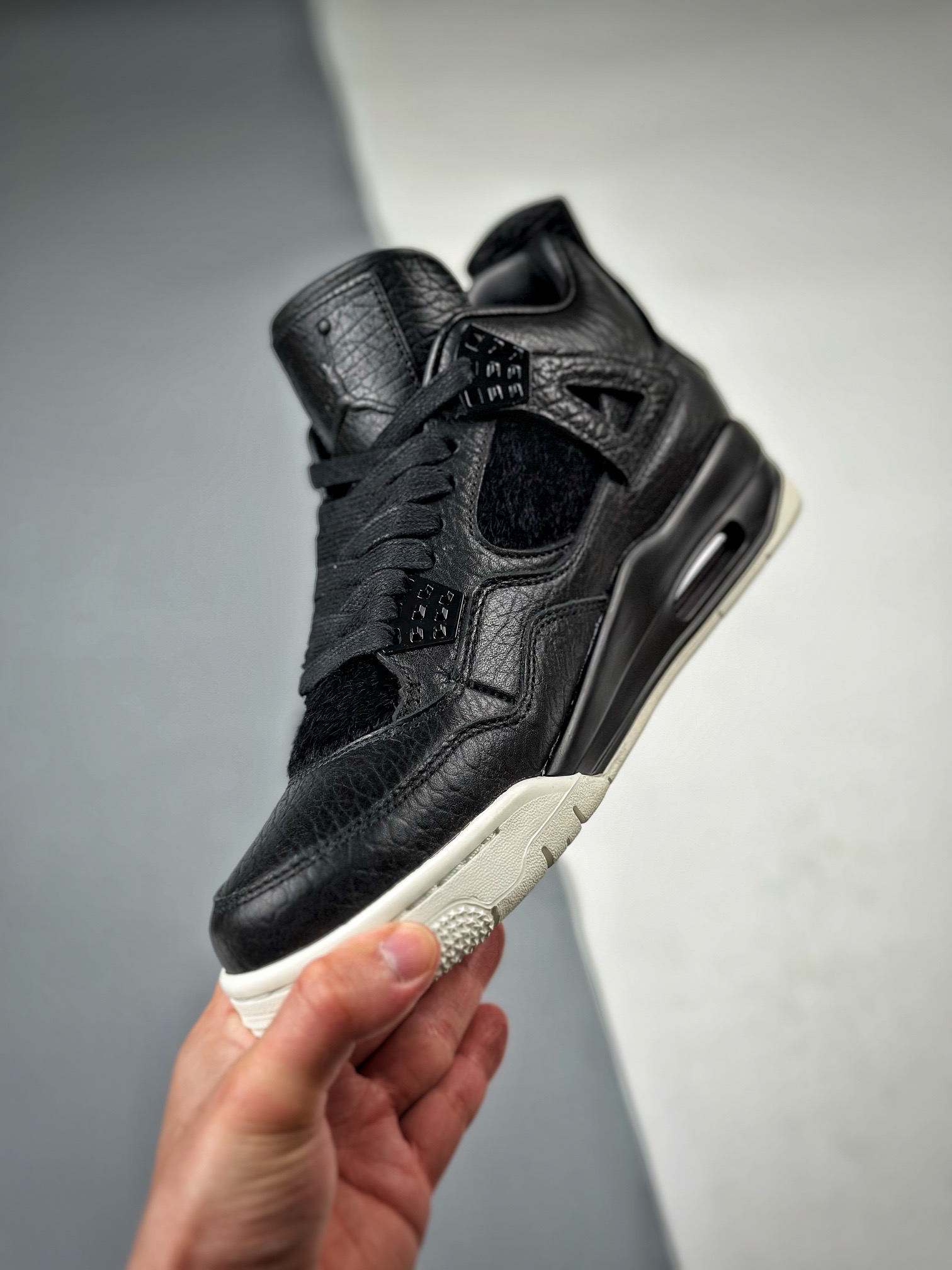 Air Jordan 4 pony hair black