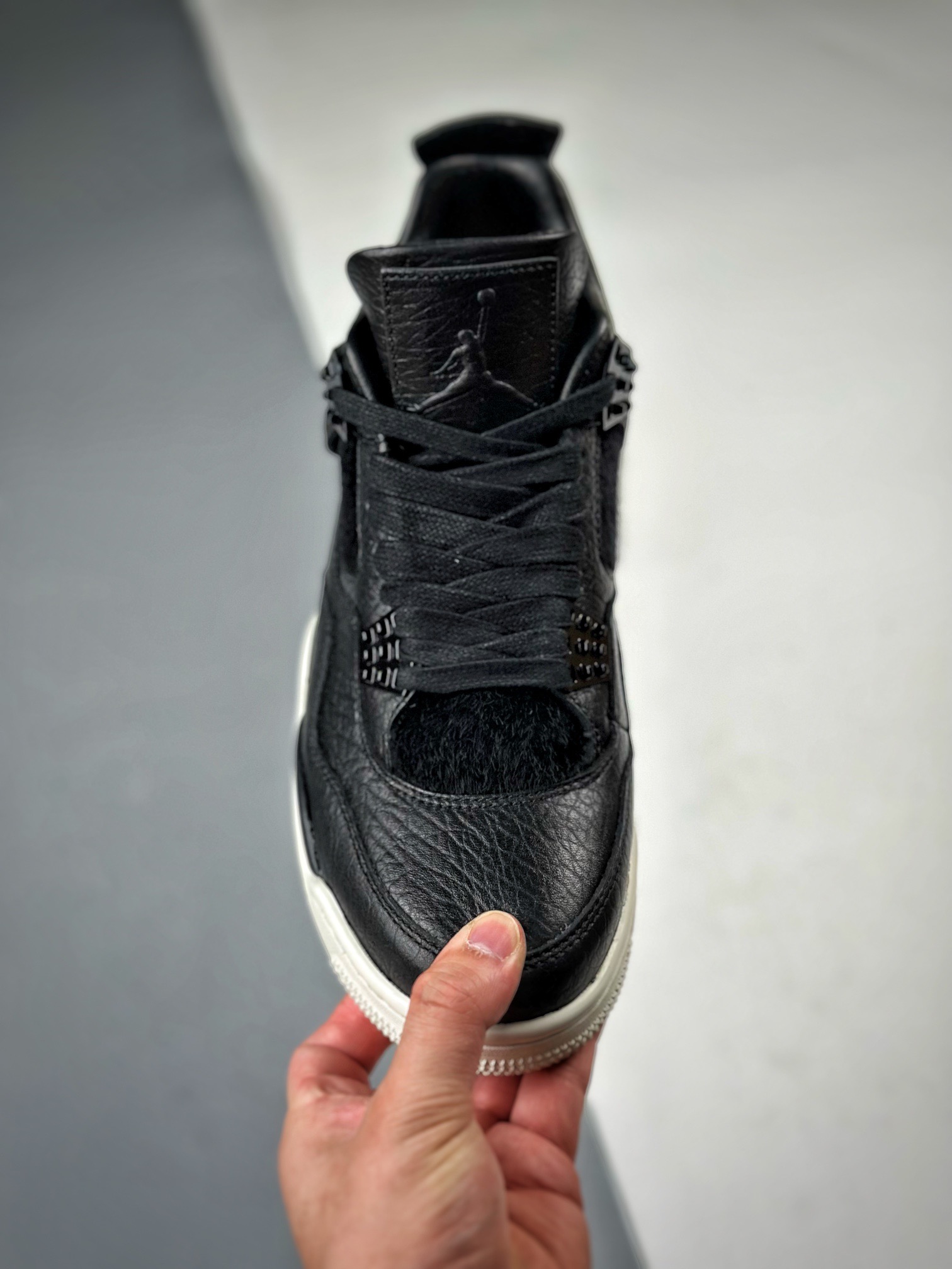 Air Jordan 4 pony hair black